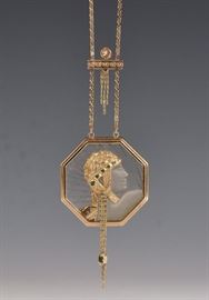 Erte 14k Gold Pendant Necklace
1 1/2" crystal pendant set with emeralds
19" long chain, 16.7 dwt gross, signed
