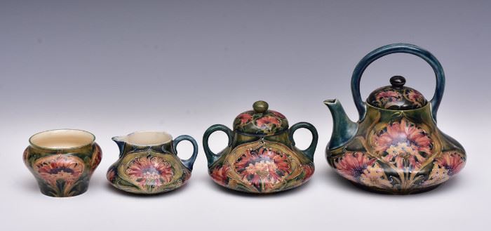 Moorcroft Brown Chrysanthemum Tea Set
teapot, 6 3/4" high, creamer, 2 1/2" high
sugar 4" high and bowl 2 1/2" high
circa 1913