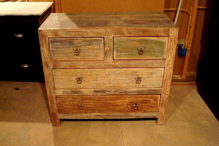 Arhaus distressed finish chest of drawers.