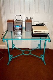 glass & metal table, JVC  5 cd stereo, XBox 360 units.