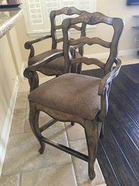 pair of bar stools.      matching with previous cabinet and dining set.                                                                                                                H/64" x W/56"