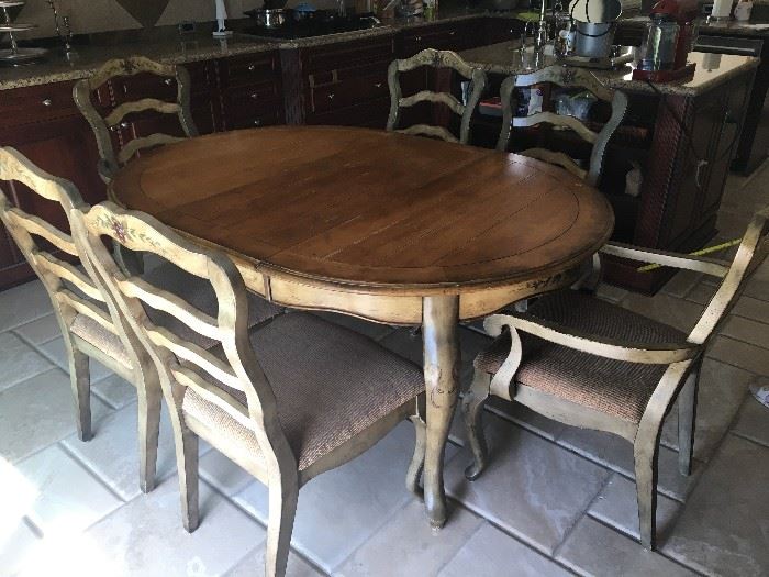 dining table set with one inserted leaf and 6 chairs.         matching with previous side buffet cabinet and  next 2 bar stools.                                                                                                               L/160" x W/120" (with one leaf inserted)