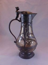 Large pewter pitcher w/woman lid.