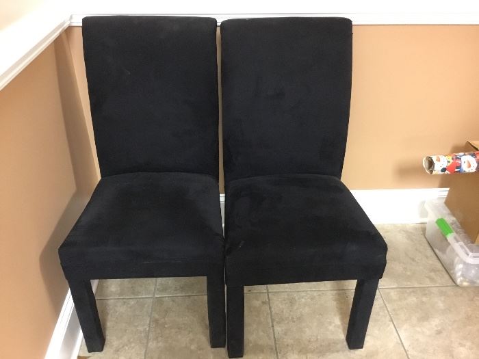 Pair of all black chairs