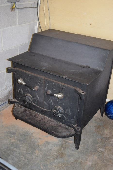Fisher Wood Stove has claw feet with it