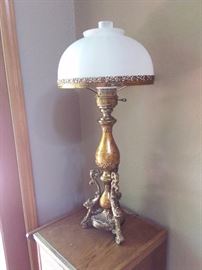 Vintage brass and ceramic lamp with Asian accents. 