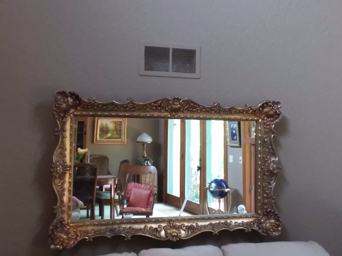 Large gold accent framed mirror! Items reflected in mirror not for sale except lamp