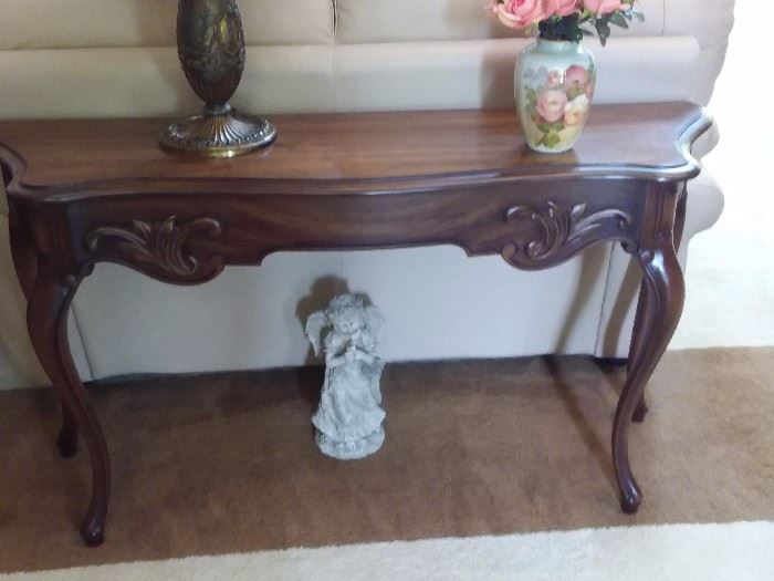Sofa table, angel and vase...lamp and sofa not for sale