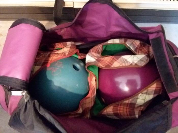 Two professional bowling balls and bag