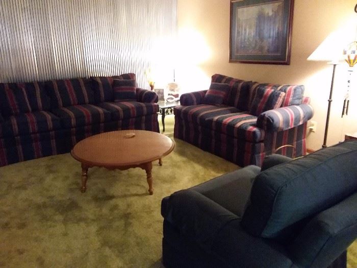 Living room set up! Perfect for a starter or family room! Woodwark sofa/couch and love seat, vintage coffee table and also corner end/coffee table glass top in corner set has accent chair with matching table and floor lamp! Excellent condition!