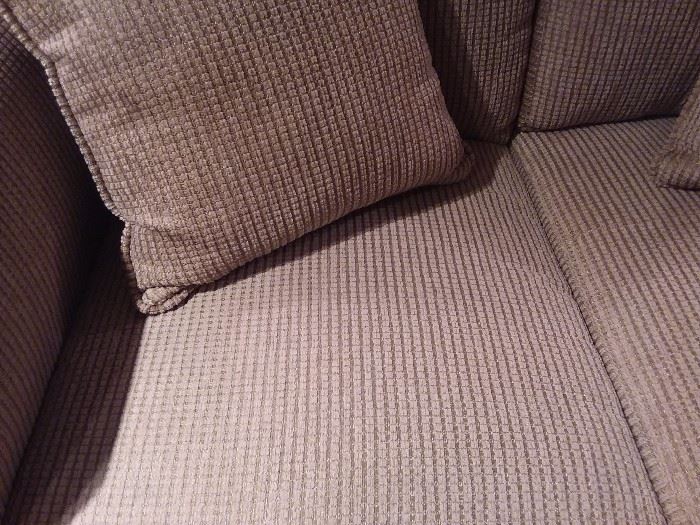 Tan/beige loveseat excellent condition and great upholstery fabric