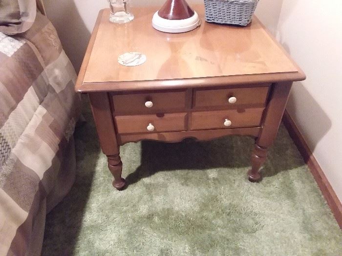 Matching end tables with round coffee table