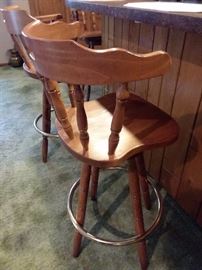 Matching four swivel bar stools with foot ring