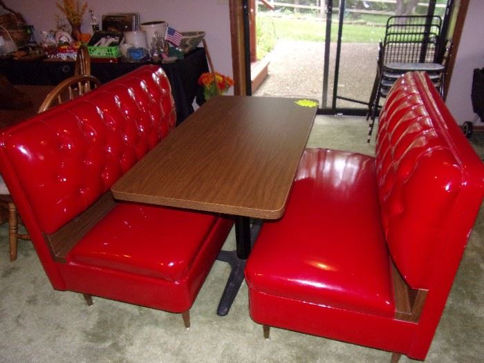 Vintage  brand new condition Diner Booth Set of slick vinyl tufted benches with table in Candy Apple Red.  Reproduction online sells for $2298.16. OUR PRICE: $500  See reproduction at https://www.retroplanet.com/PROD/18728.html?gclid=CjwKCAjw8_nXBRAiEiwAXWe2ydLb-gAb7OqqAj969yzqH-dZ1tdhWwWfe8SM-02NaV76K_1sBulvwxoCxDsQAvD_BwE