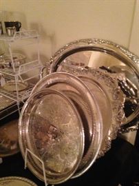 Some of the many silver plate trays