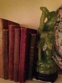 Antique books; Asian statue