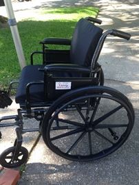 Like new wheel chair (Orig. $700) - used once