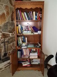 Bookcase/cabinet. Tons of books