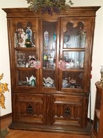 China cabinet full of collectibles