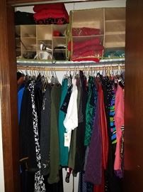 Closets upon closets full of women's clothes. Size L - 1x