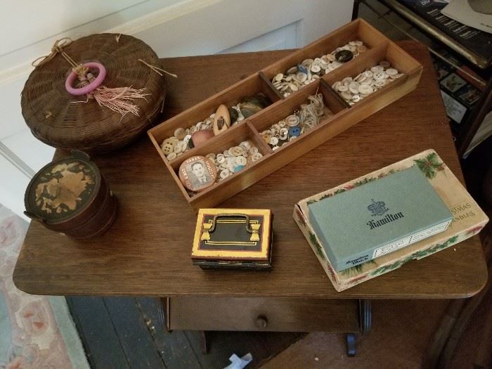 Antique Sewing stand, hundreds of antique Ivory and MOP buttons, antique Chinese woven sewing basket, antique treenware string holder, miniture tin document box (Salesmans Sample??) 