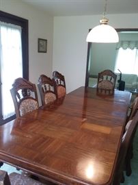 Table-- 2 leaves and 8 chairs