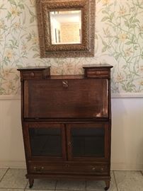 Antique desk with glass fronted display areas