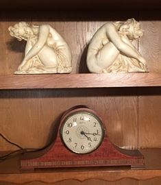 Seth Thomas mantle clock. 
Set of lady statues or book ends