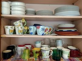 Lots of plates, bowls, coffee mugs, and glasses.