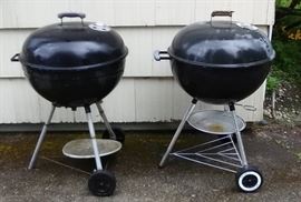 Two well-used Weber grills.