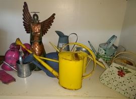 Watering can collection.