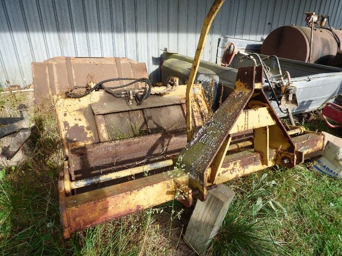 Grading implements:  In front :  Dry Scraper fits Ford Tractor,  2nd one is clamp bucket, 3rd one is a bucket for a Bob Cat/Skidster.  There is a Pulverizer that fits Ford Tractor.