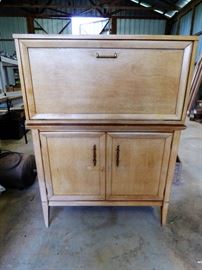 Mid Century Modern 2 piece cabinet Top lets down to make a bar.