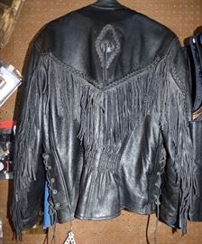Back view of ladies leather fringe biker jacket