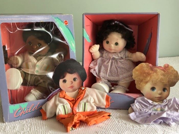 My Child Dolls in original boxes.  2 spare outfits on display cards 