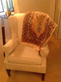 Silk oriental rug ....wing back chair