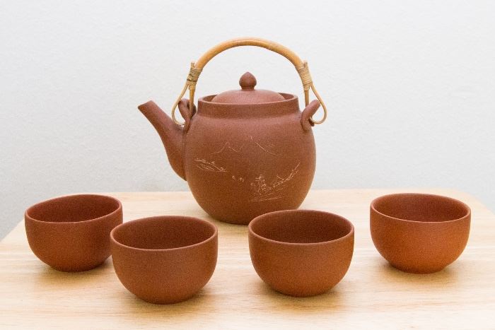 Vintage Stamped and Etched Red Clay Tea Pot w/4 cups.  $33.00