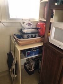 More kitchen items and carts and microwave holders