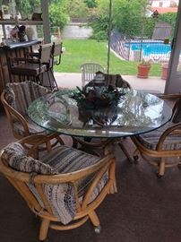 Glass pool room table With four chairs cushions need to be redone