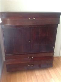Large dark wood cabinet