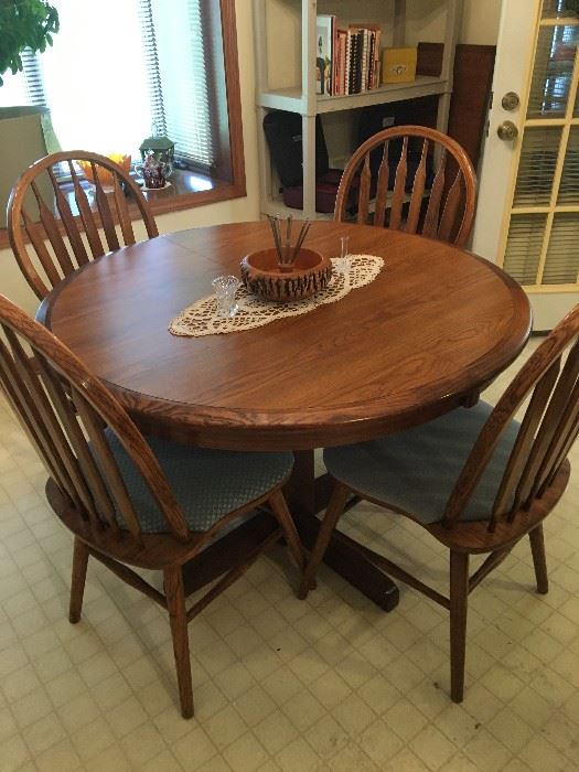 small dining table with 1 leaf and 4 matching chairs