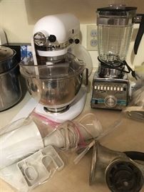 Kitchen Aid Mixer with various pieces to go with it, blender and other small items