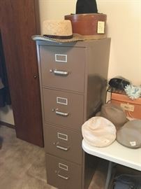 file cabinet and hats