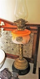 Antique brass and porcelain oil lamp