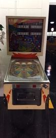 Gottlieb 1974 Far Out 4-Player Pinball Machine. Two banks of 5 drop targets, 3 pop bumpers, 2 slingshots, two 3" flippers, one side rebound kicker, and one side return ball gate. Great overall condition. Back Glass is clean. Purchased in Switzerland. Runs on 220 V. Add to your collection!