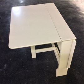 Wood Drop Leaf Table. There are four available. 