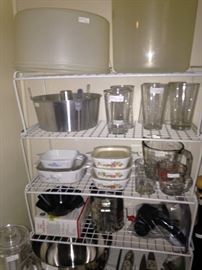 Corning ware, Tupperware, measuring cups, and other helpful kitchen selections
