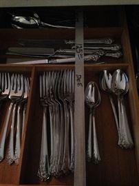 66 pieces of highly polished stainless steel flatware