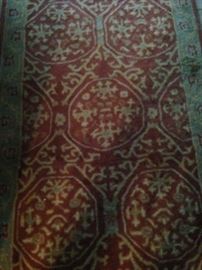 3 feet x 5 feet rug in reds and golds