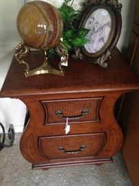 One of two matching side 2-drawer tables